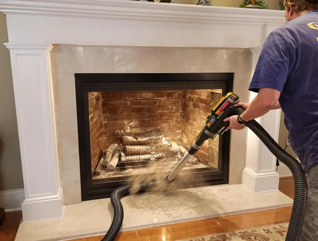 Fireplace cleaning performed by Jurupa Valley Chimney Sweep in Jurupa Valley, CA